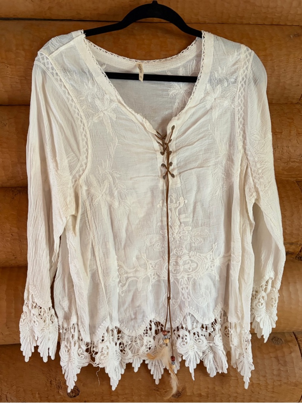 Cream Crochet Lace-Trim BohoTop with leather feather ties. fits medium/large